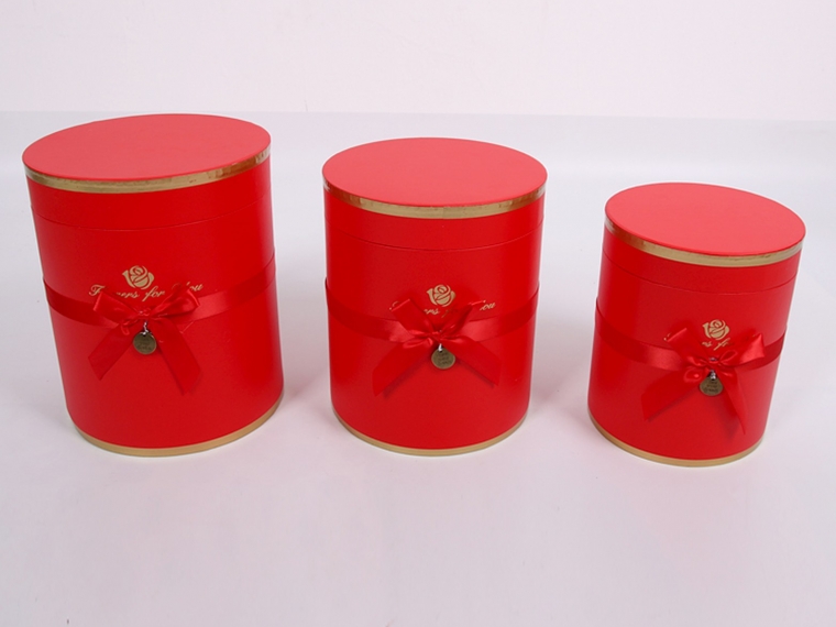Набор коробок круглых с бантиком  F1  1/3 Размер:21X25.5 cm, 19.5X23.5 cm, 17X20.5 cm Цвет: красный
