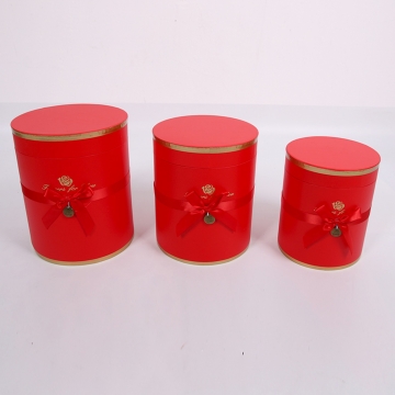 Набор коробок круглых с бантиком  F1  1/3 Размер:21X25.5 cm, 19.5X23.5 cm, 17X20.5 cm Цвет: красный в компании Декорпак